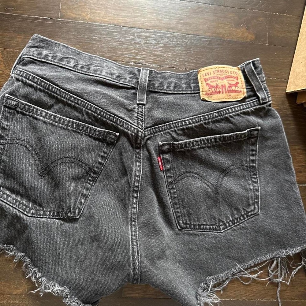 Vintage grunge Levi's black denim shorts